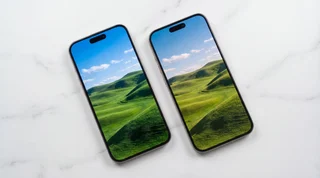 iPhone screens being compared on a clean repair workbench